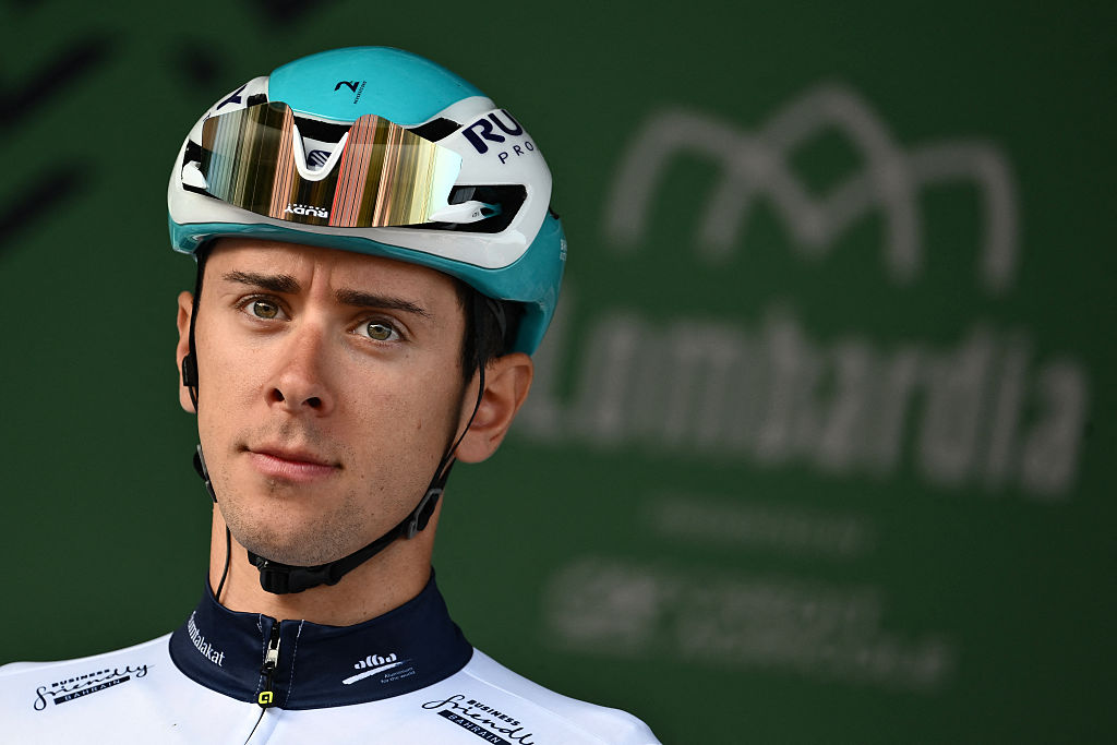 Bahrain Victorious&amp;rsquo;s Italian rider Antonio Tiberi looks on from the sign-in podium ahead of the 119th edition of the Giro di Lombardia (Tour of Lombardy), a 238km cycling race from Como to Bergamo on October 11, 2025. (Photo by Marco BERTORELLO / AFP)