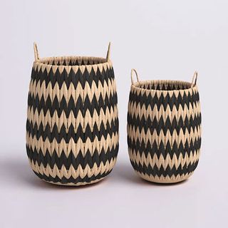 Decorative baskets in wicker, with black zig zag horizontal pattern