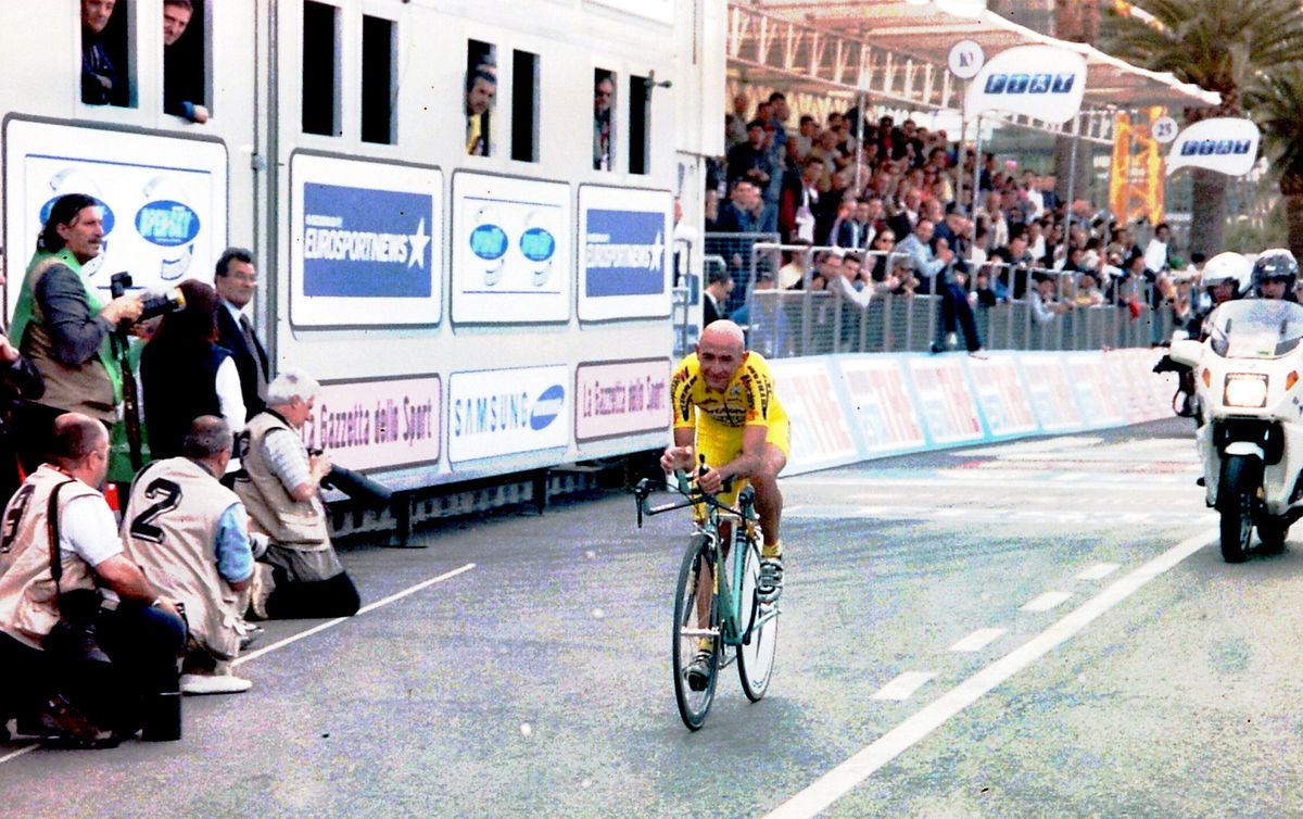 Pantani crosses the line in Pescara in 128th place. His race would end early and on a sour note, as an insulin syringe was found in his hotel room