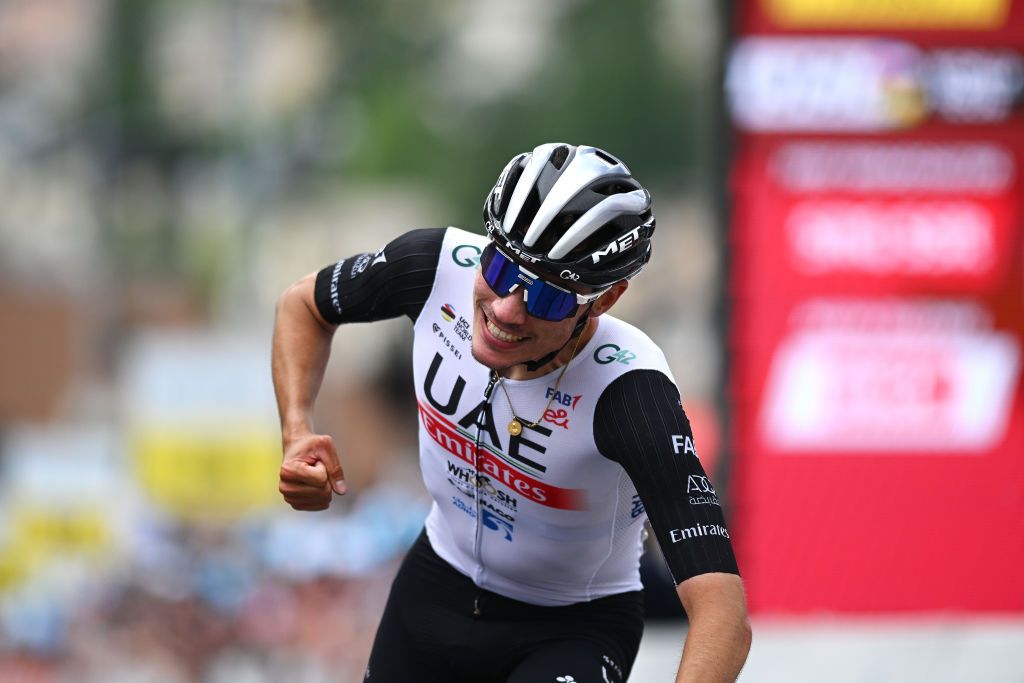 LA PUNT SWITZERLAND JUNE 15 Juan Ayuso of Spain and UAE Team Emirates celebrates at finish line as stage winner during the 86th Tour de Suisse 2023 Stage 5 a 211km stage from Fiesch to La Punt 1696m UCIWT on June 15 2023 in La Punt Switzerland Photo by Dario BelingheriGetty Images