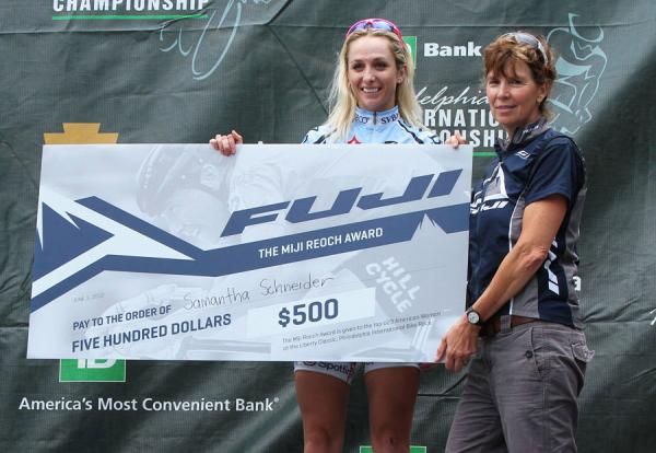 Tracy Lea of Fuji presents the Mary Jane (Miji) Reoch Award to Samantha Schneider (TIBCO-To the Top), the best under 23 rider in the Liberty Classic.