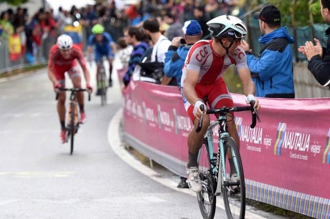 Michal Kwiatkowski (Poland) checks his gap back to the chasers
