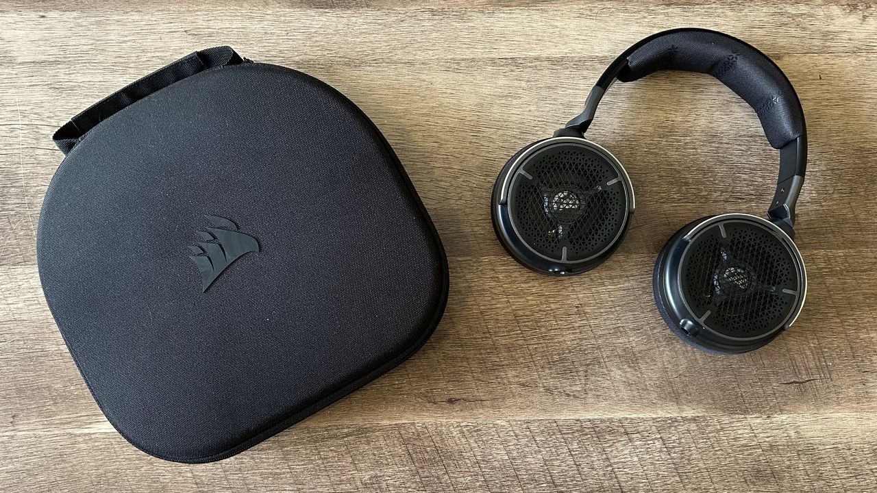 Corsair Virtuoso Pro headset and case on a wooden table