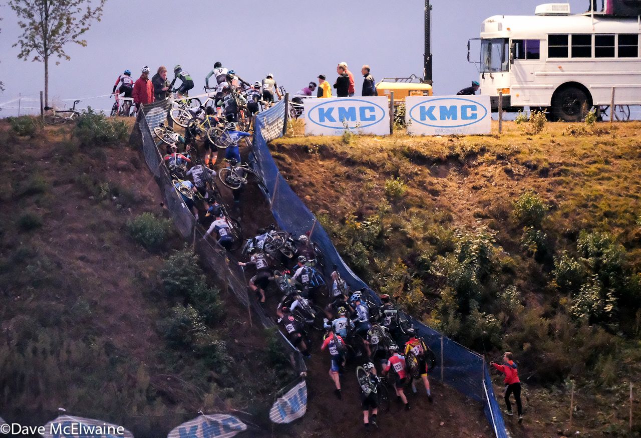 The Elite men scrambling up the steep run-up early in the race