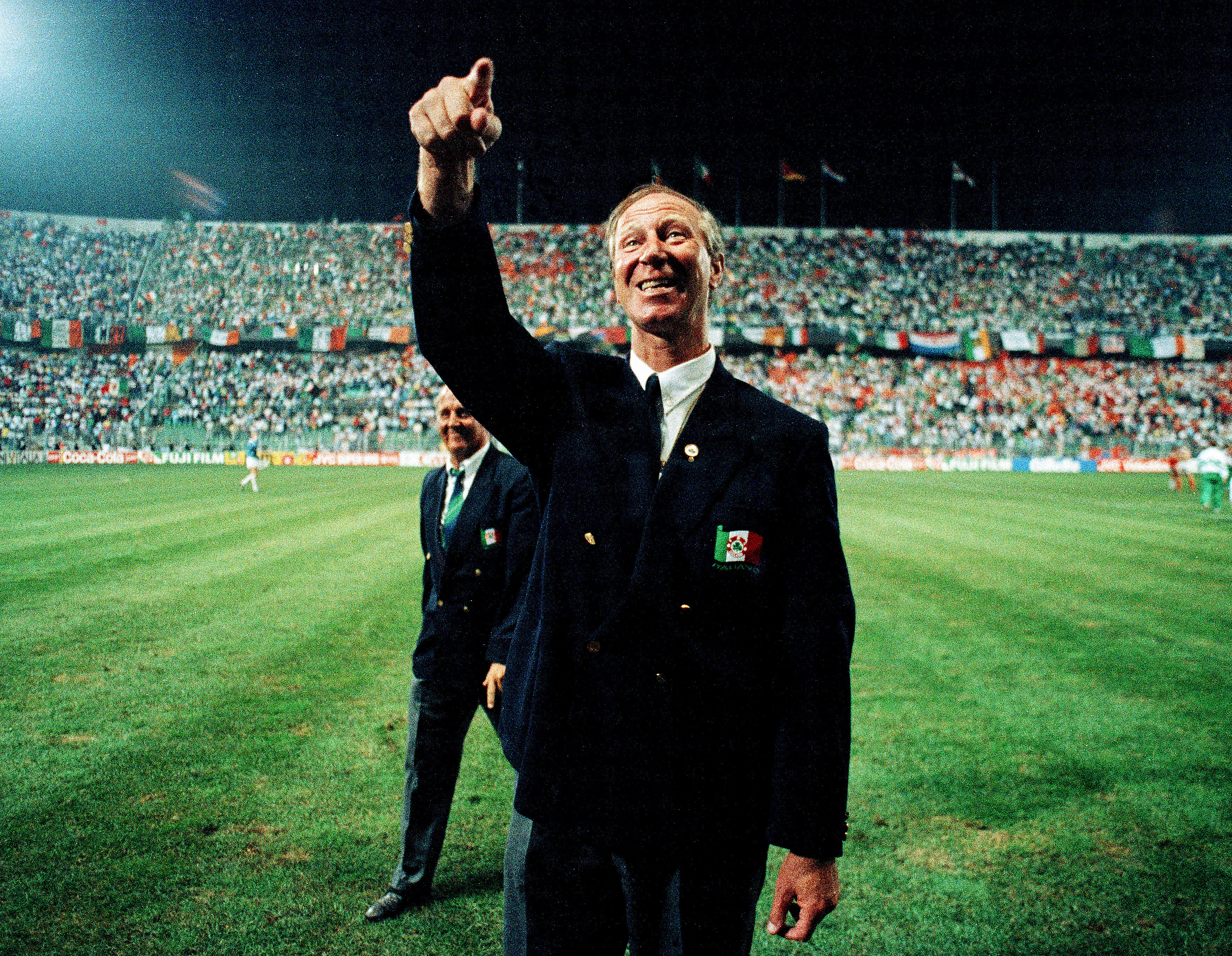 Republic of Ireland manager Jack Charlton gestures to the crowd after a game against the Netherlands at the 1990 World Cup.