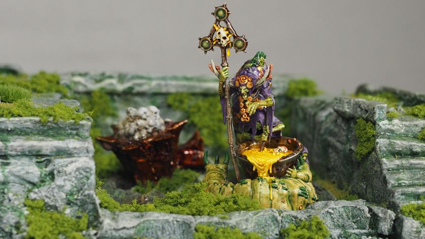 A Cystwitch model from Warhammer Quest: Darkwater, placed in a ruined, overgrown setting