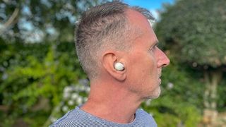 Sony WF-1000XM5 earbuds worn by Tom's Guide Audio Editor Lee Dunkley