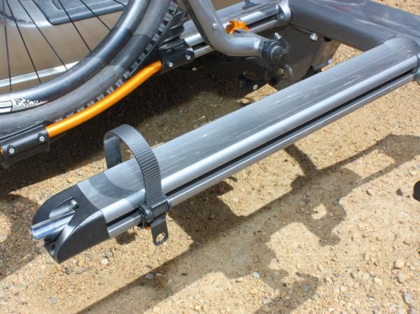 The simple ratcheting straps work well enough and have a wide range of adjustment