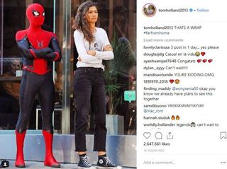 Spider-Man and Michelle standing together with arms crossed