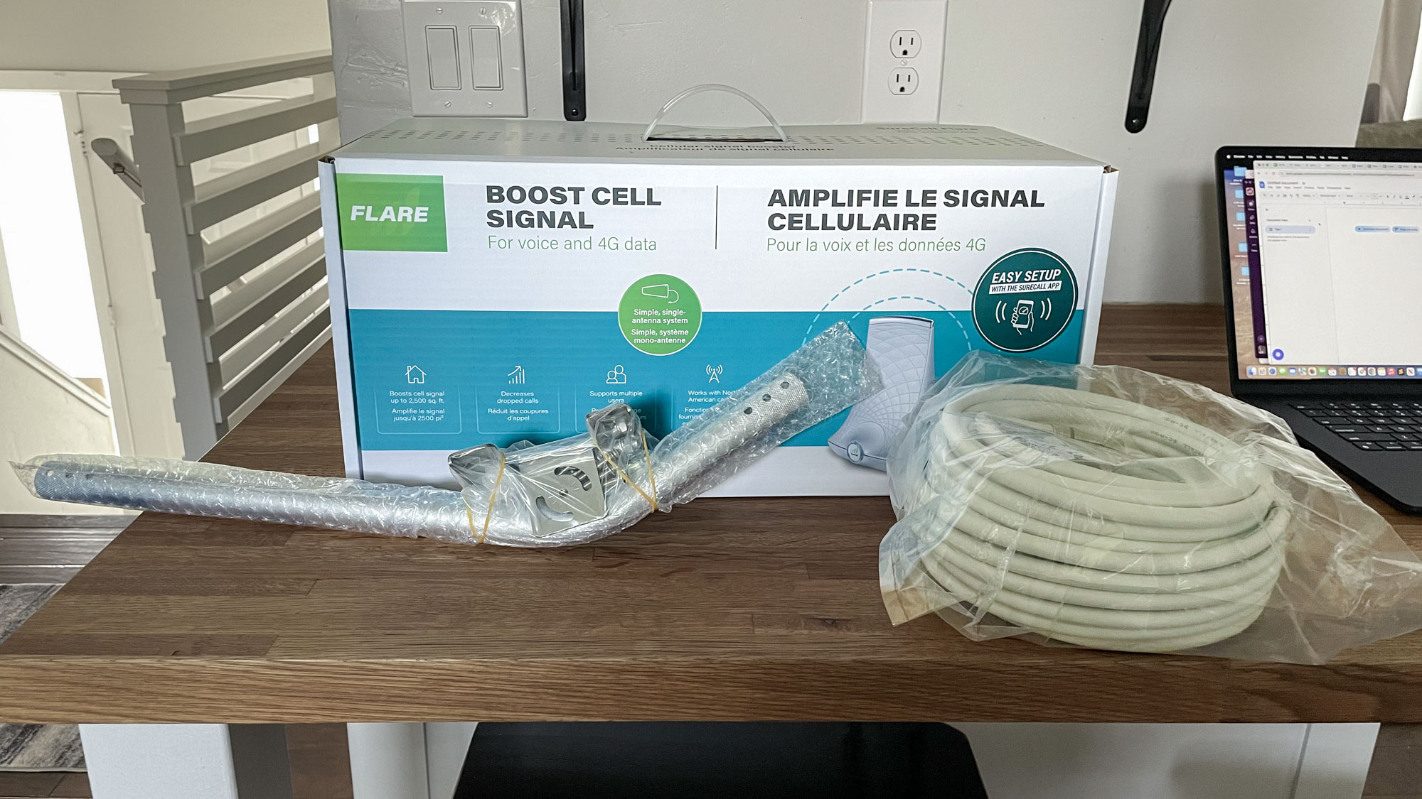 SureCall Flare 3.0 cell phone booster packaging and contents.