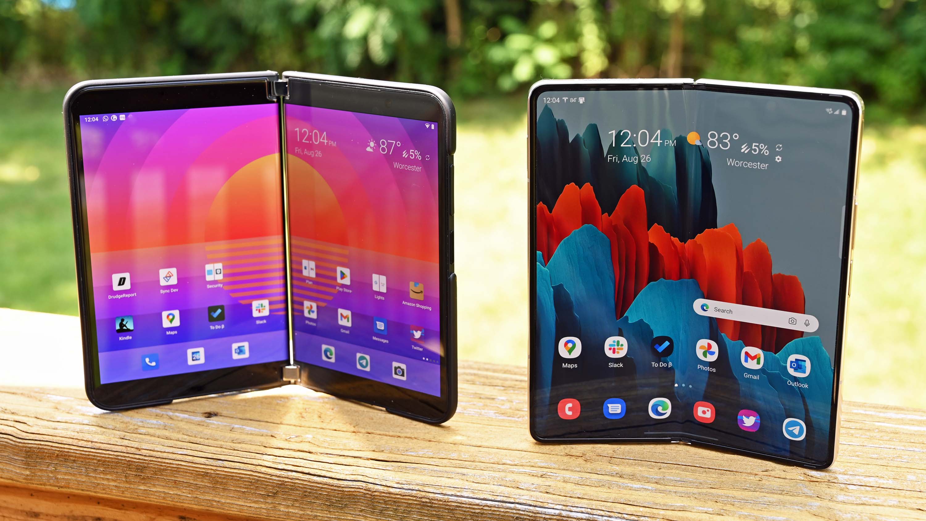 The Samsung Galaxy Z Fold4 and Microsoft Surface Duo 2, side-by-side, with screens opened.