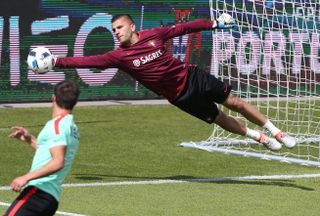 Portugal goalkeeper Anthony Lopes makes a save in a training camp ahead of Euro 2016 in June 2018.
