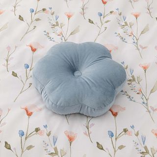 Petal shaped blue velvet cushion