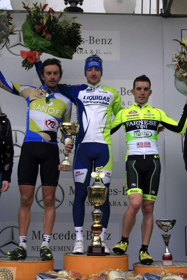 The stage 1 podium with Colli, Viviani and Favilli
