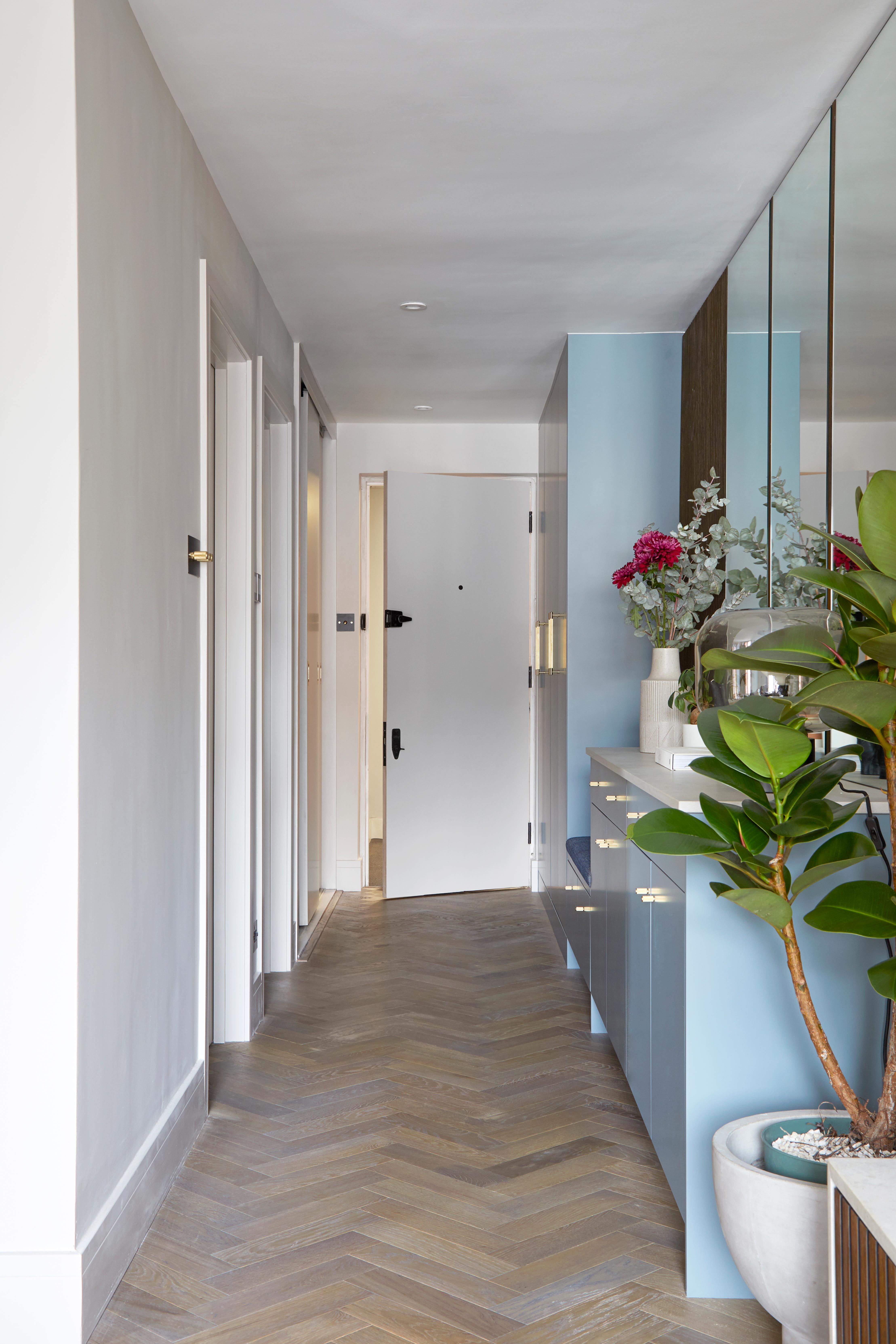 Blue and white hallway of an apartment