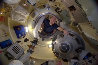 European Space Agency astronaut Alexander Gerst of Germany poses for a photograph on the International Space Station in July 2014.