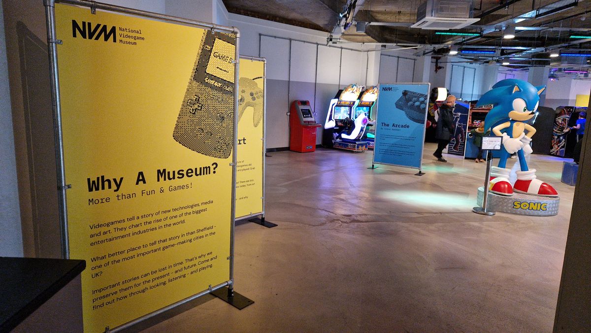 The entrance hall of the NVM, showing placards next to a giant statue of Sonic the Hedgehog