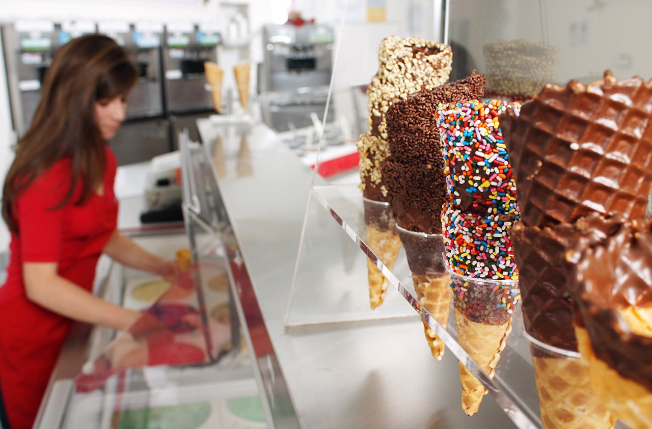 Close up of ice cream waffle cones in an Ice Cream Shop.Focus is on the cones.