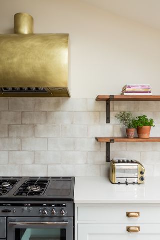 polished brass extractor by Sola Kitchens