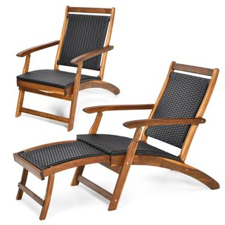 A dark wooden lounge chair with black fabric and a footrest