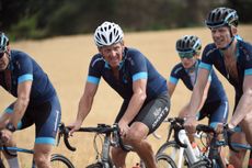 Lance Armstrong bikes The Tour de France for charity