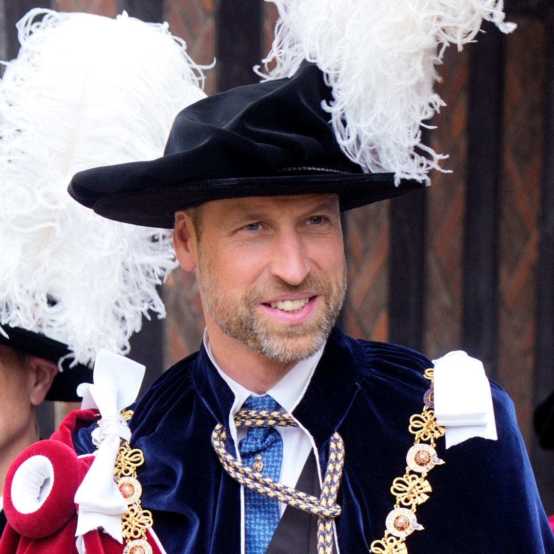 Prince William wearing a plumed hat