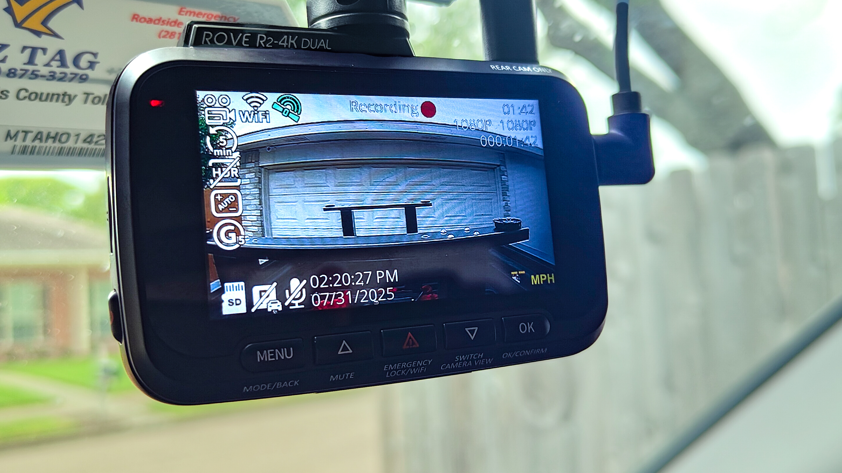 A closeup shot of the Rove 2K-4K Dual dash cam's monitor showing a feed from the rear camera which gives you a full view of what's inside the bed of the truck where it's installed