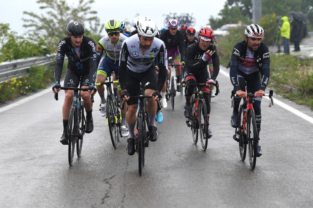 SESTOLA ITALY MAY 11 Nico Denz of Germany and Team DSM Victor Campenaerts of Belgium and Team Qhubeka Assos Valerio Conti of Italy and UAE Team Emirates Jacopo Mosca of Italy and Team Trek Segafredo in the Breakaway during the 104th Giro dItalia 2021 Stage 4 a 187km stage from Piacenza to Sestola 1020m Rain girodiitalia Giro UCIworldtour on May 11 2021 in Sestola Italy Photo by Tim de WaeleGetty Images