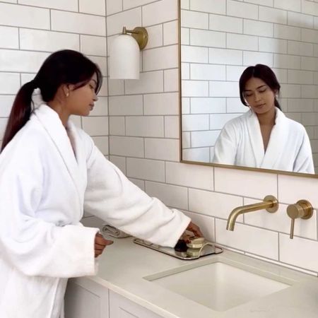 Woman in a robe at the spa