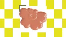 Yellow and white checkerboard background with a white square in the middle that has a coral-colored, flower-shaped dinner plate