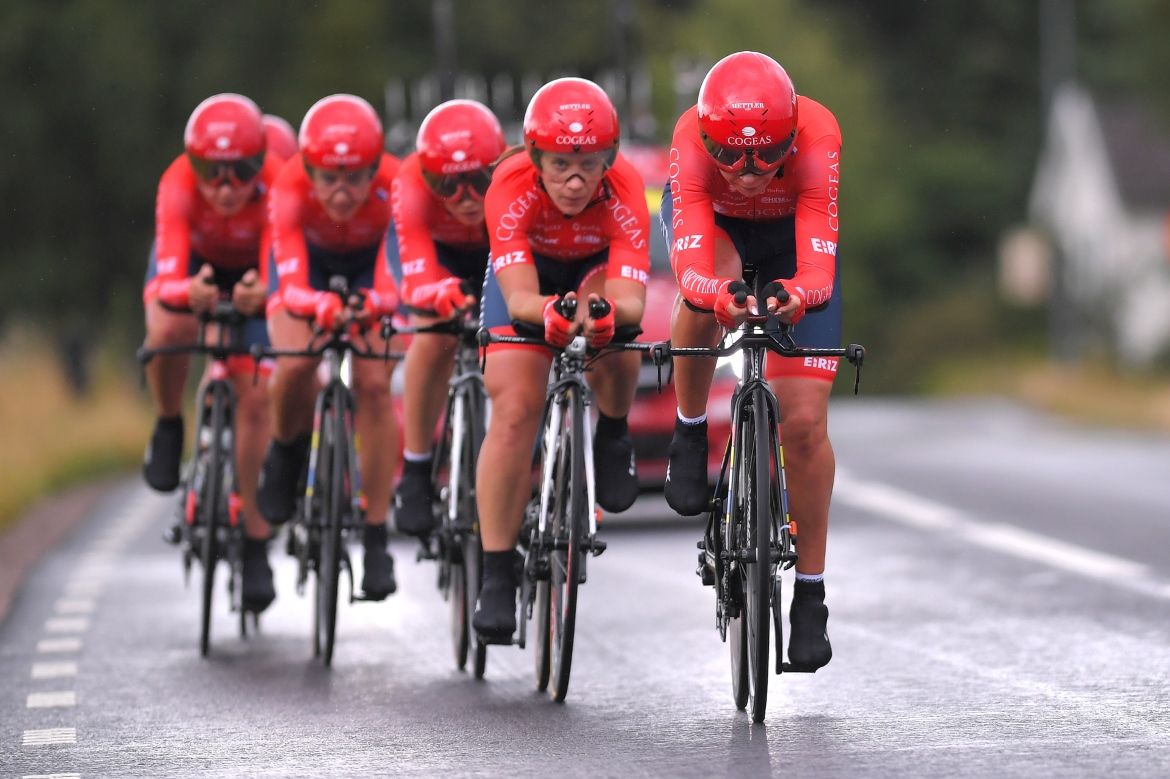 The red Cogeas - Mettler Pro Cycling Team colours stood out in the rain
