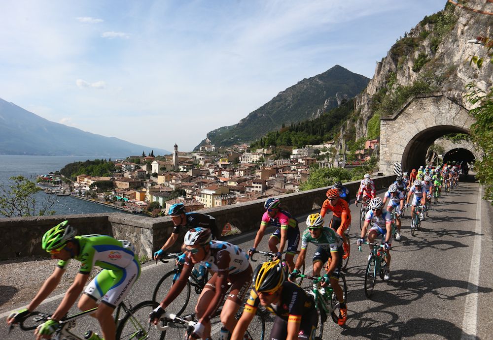 The peloton heads out above the starting town of Limone sul Garda during stage two of the 2014 Giro del Trentino