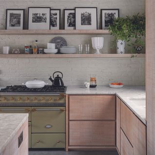 Light oak kitchen with olive green range cooker
