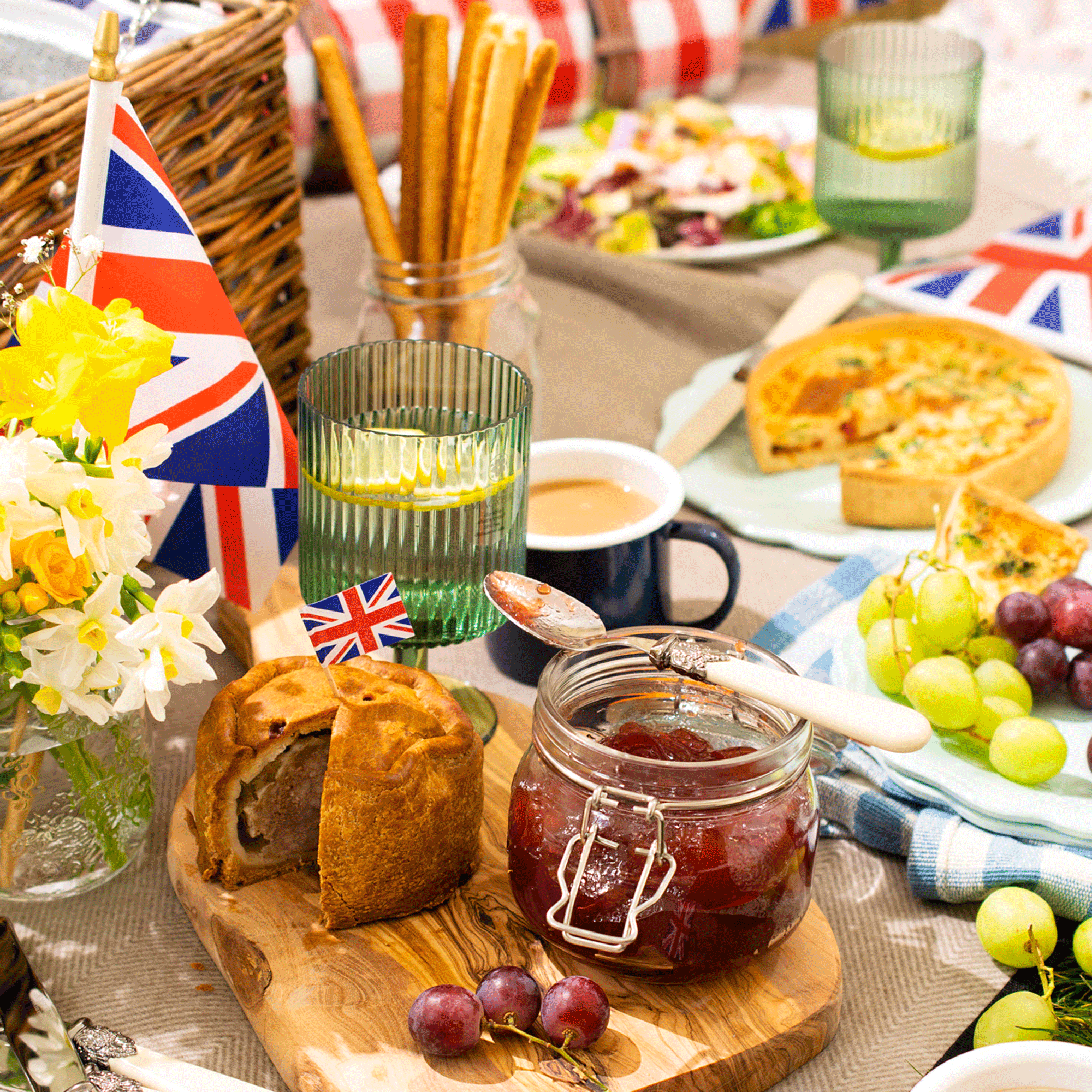 coronation picnic with union jack flags in baskets