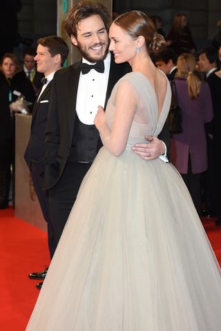 Sam Claflin and Laura Haddock at The BAFTA Awards 2015