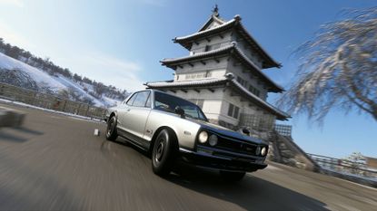 Forza Horizon 6 photo of 1971 Nissan Skyline driving in front of Hirosaki Castle in the winter