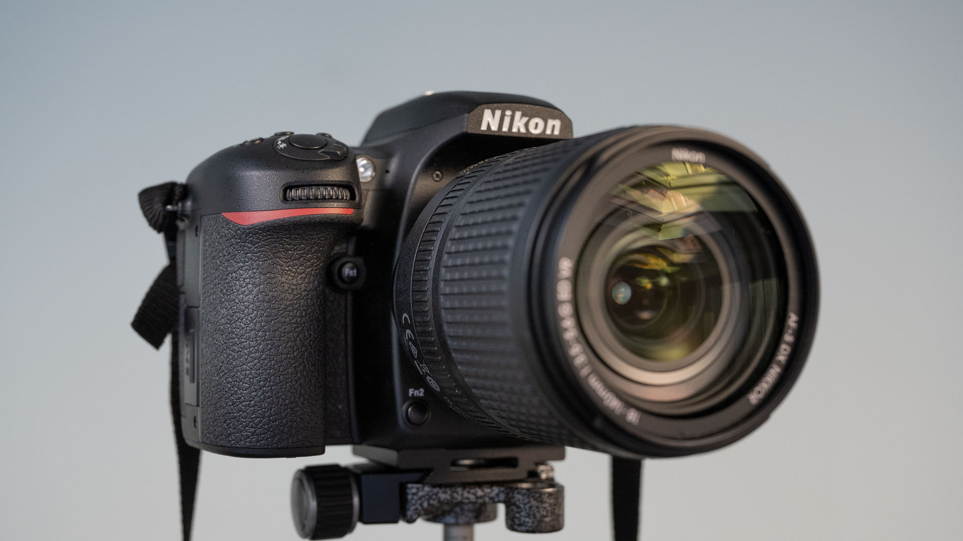 Nikon D7500 on a tripod showing deep grip to hold