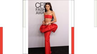 Zendaya wears a red satin skirt co-ord as she attends the 2021 CFDA Awards at The Seagram Building on November 10, 2021 in New York City