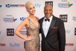 Pop star Katy Perry and Byron Allen at Allen Media Group’s 2018 Entertainment Studios Oscar Gala in Los Angeles.