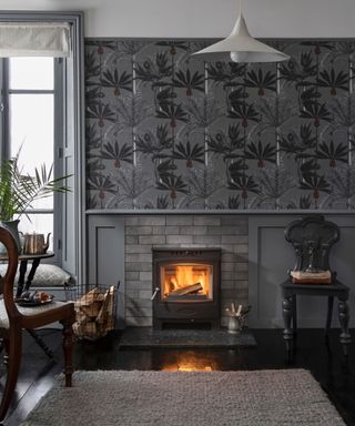 Arada Stove in living room with grey wallpaper and grey wall decor