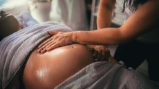Woman getting a prenatal massage