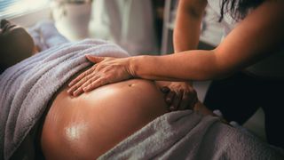 Woman getting a prenatal massage