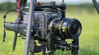 The Sony Venice 2 cinema camera sitting in grass