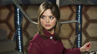 Jenna Coleman's Clara Oswald at TARDIS console in Doctor Who