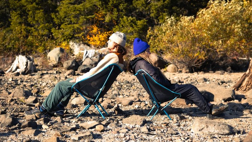 Campers at the beach sitting in Helinox Chair One (re) camping chairs