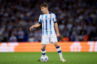 Aihen Munoz of Real Sociedad with the ball during the Group D - UEFA Champions League match between Real Sociedad and SL Benfica at Reale Arena on November 08, 2023 in San Sebastian, Spain.
