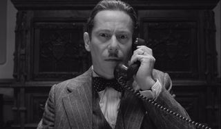 The French Dispatch Mathieu Amalric takes a phone call