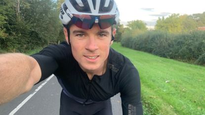 Tom Couzens taking a selfie on a solo bike ride