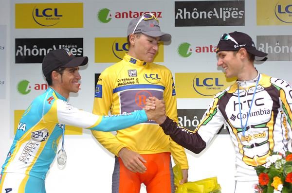 The top three men on the GC congratulate each other.