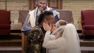 Bini kissing Ari on their wedding day in 90 Day Fiancé season 9